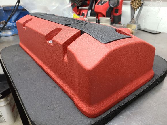 Smoothed out caProper built vented valve cover drawing air from above the baffle platesting marks