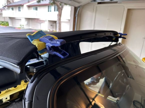 Then he used a clamp WITH microfiber cloths to prevent marring the finish. Steps like this show that he's proud of his work. 