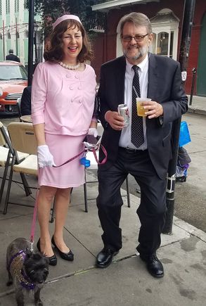 Friends of ours who have an apartment in the quarter. She's got her Jacky-O on and he's her secret service agent. Note the ear piece. Their dog is named NOLA.