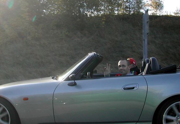 ON THE FREEWAY BRANDON WAVING.jpg