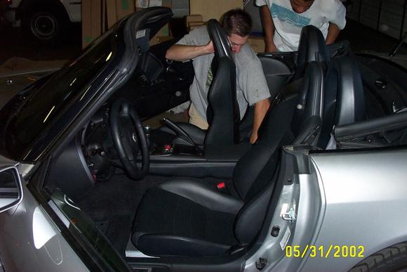 Neil puts the last seat in