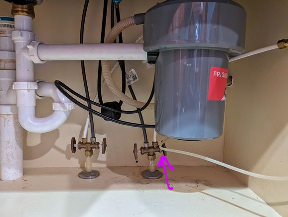 ^I think this valve is for the fridge water supply.  I worked it and made it very tightly closed.

