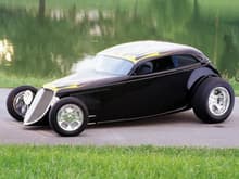 gofathers streetrod . was a ppg or dupnt poster car cant remember love it 
oh and boyd coddington personally designed these wheels