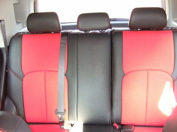 Clazzio red leather seat covers with red stitching in the back