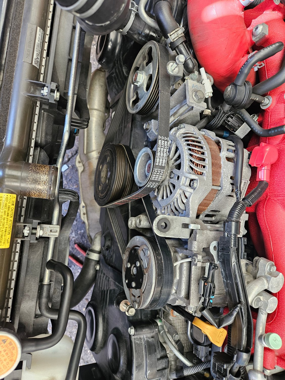 New accessory belts. Air con is a stretch belt and required a tool. 