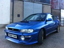 My reddish blue subaru
