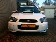 My lastest scooby, just bought so no better pictures yet. It's a USDM STI Blobeye. Stock 2.5L Turbo with DCCD.. Like it alOT!