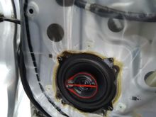 Rear speaker screwed direct to door skin