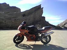 @ Vasquez rocks, Ca. with &quot;Badger&quot; and his dualsport. Mothballs, my Vtwin parked in front of a hell of a backdrop. Was as fun as it looks.