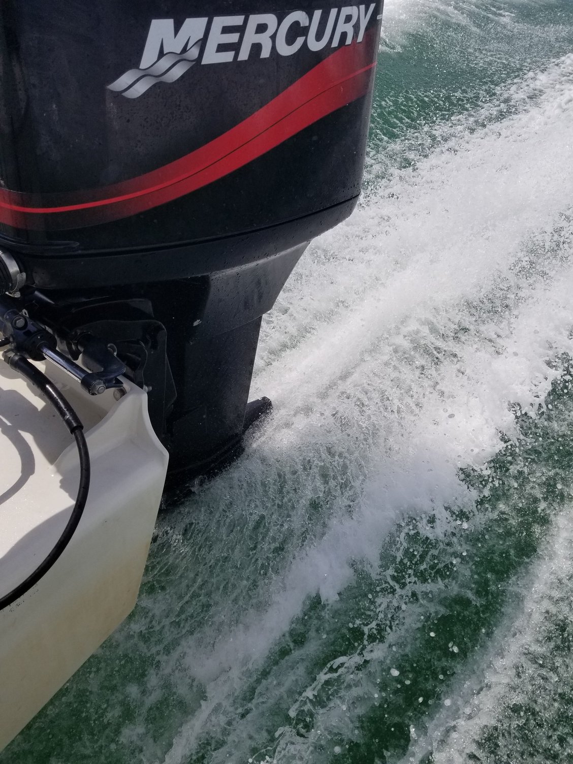 Outboard mounting height and low max rpm. The Hull Truth Boating
