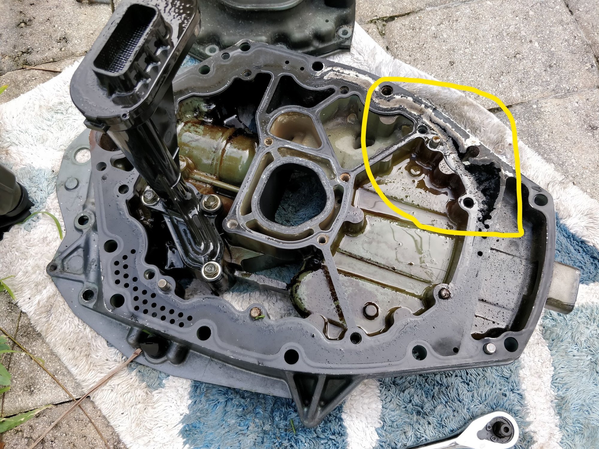 2005 Yamaha F150 hole in upper exhaust burned right through apron on