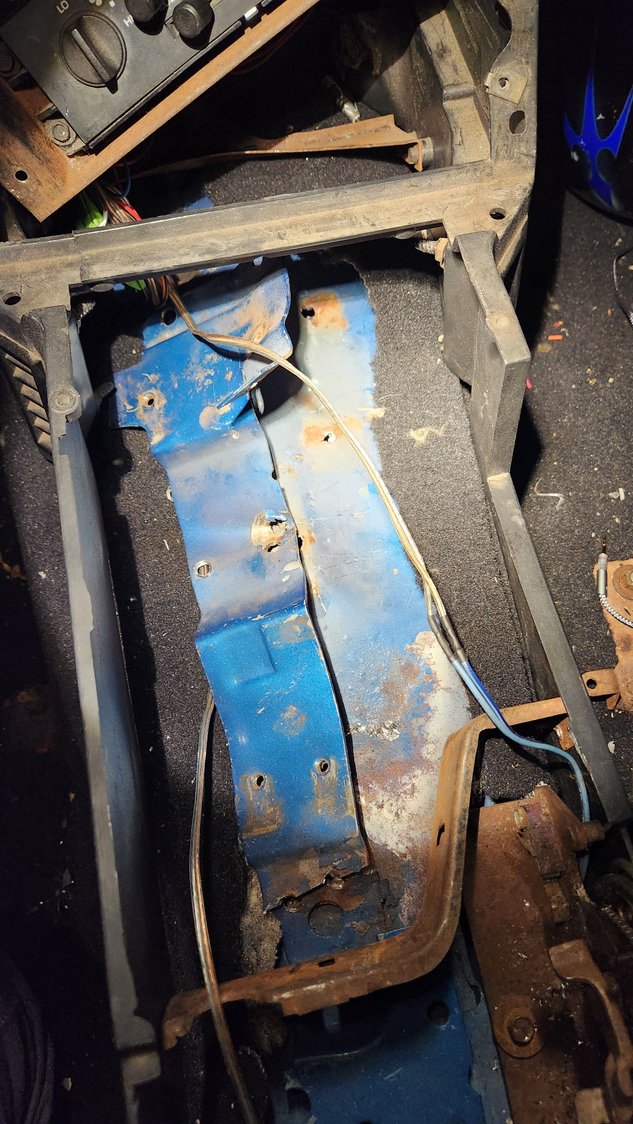 Need to drill out the spot welds for the auto shifter mount.