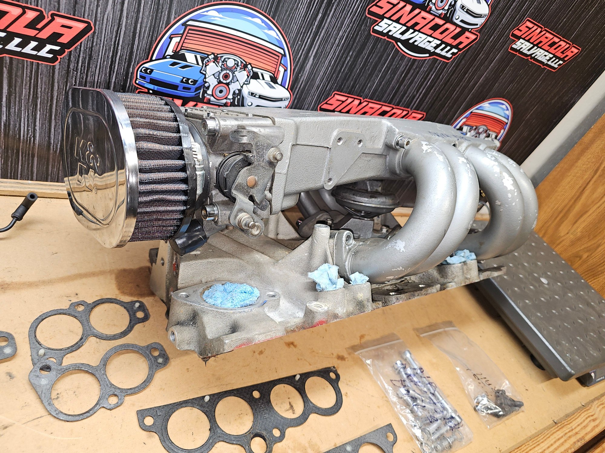 Speed density TPI intake. For what its worth it has a new EGR on it. Chrome allen head bolts. 