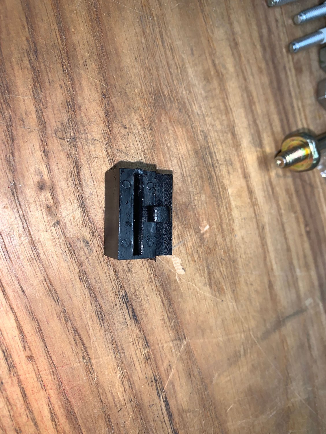 Plastic block or spacer.