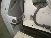 Passenger side mid fender bracket bolted in.