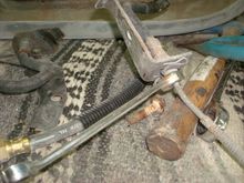 Using a line wrench.


.