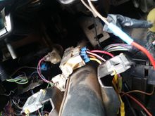 Found another connection the burnt wire split off into. It plugs into the steering column here it's on the very end.  The third section.  Past the fire wall the wire routes to the master cylinder. I assume it's brake pressure sensor.