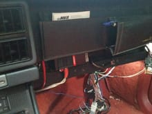 The 8awg wiring, RCA's, the speaker wiring part of the original harness... all tuck under the dash trim panel.