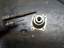 Picture of the little grinding bit I used to remove the last of the weld.  I then used a nail punch to gently hammer out the bolt.