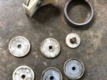 I discovered these somewhere in the car 2 years ago. (Never mind the metal ring...still don’t know what that’s for). 
I was able to find them on eBay and I think they’re called Window Up Stops 