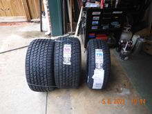 Let me lay some rubber/groundwork,  4277 inspired me with his 335 (335!! mm 13.2 inch) rear tires.  Go Big or Go Home!! Since my turbo-fin OEM wheels will only allow P235 or 9.25 inch, which is not shabby by any means, anything wider requires new wheels.  I decided to by Michelin's for my OEM wheels, and splurge for another radical set.  These are P295 or 11.6 inch tires. Shown beside the P235 OEM tires.