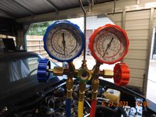Recharged and it is blowing cold again, I figure in was running in the 450+ psi range when the relief valve blew, now around 250/40 psi.  