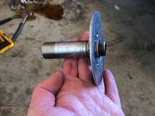 It is threaded on both ends. On the inside at one end and outside at the other.