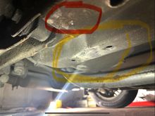 Hi - have seen a few posts that talk about where to place jack stands in the rear of the car - need to lower rear suspension so I can change the springs.  Do I put the jack stands in the yellow area or the red?  It looks like previous owners have in both, just don’t want to break anything.  I can usually only work in short amounts at a time so may end up being in the jack stands for a couple weeks.  Thanks for your advice!