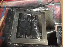 Floor cut out, new seat frame tack welded in. 