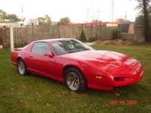 This is a 1992 Pontiac Firebird Formula.
The main difference is that I purchased off Ebay the ground effect kit from the same year non-Formula. There was many brackets and holes to be made in order for the kit to fit correctly. However it was pretty straight forward since the design already fit the car. I also had to buy a new hood and qaurter panel due to a minor front collision. If you have ever searched for a original cal induction hood you will find that they are not easy to get your hands on. So I had to go with the standard hood. Which turned out well enough for me. It turned out almost like stock.
My very first car when I was 17 was a  1992 Pontiac Firebird GM red with the same ground effect kit with the gold rims and the Ttop. 
So I decided that I wanted to merge my first car with my new Formula.