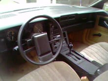 stock interior... the car had 26k miles on her when I got her at 15 years old. that was in 2003.