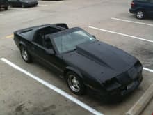 My IROC in it's natural habitat... the auto parts store parking lot lol.