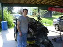 Standing next to engine and transmission