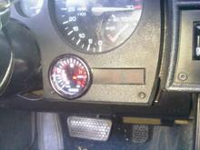 boost/vac gauge. not the easyest place to put it. lol stupid tak was stuck i guess in this pick.