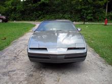It's July 6, 2008 and I got the rest of the body on the car today. The air dam doesn't fit right, it's the one from the TA trim, the one from the 90 was broke in two. So since this one doesn't fit right I'll be getting a new one soon.
