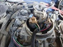 Just bought this camaro and i need help with the burned parts in identifying them. Especially the sensor behind or by the distributor cap. The wires are good just the plastic protector is burned.