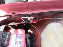 Where the old fan relay used to be. definitely hooked up incorrectly.