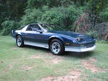 100% bone stock 1985 Z28 with a 5 speed and a rebuilt 305.