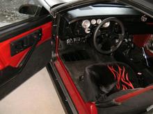 Recarpeted car including door panels.  Only Black on Red door panels I have seen.