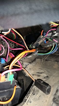 The end of the orange wire.