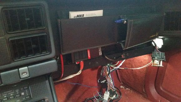 The 8awg wiring, RCA's, the speaker wiring part of the original harness... all tuck under the dash trim panel.