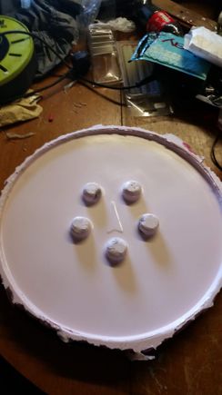 Bowling ball hubcap mould for 17" wheels.