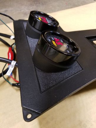 Used autometer angle rings ground down for even more angle so they are easy to view.