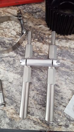 Got rid of the 6" long stainless steel bolts that tie into the cylinder head. This setup is alot more rigid and will help to prevent any flexing.
