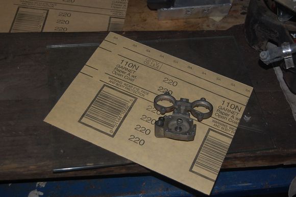 Glass plate for flatness, some 220-grit sandpaper.  All I need to "remachine" the injector cover.