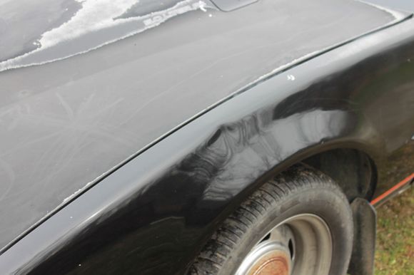 Only dent on the body, right in the crease too!  Anyone hear of using Air Duster upside down to freeze it, then heat gun to pop it out?