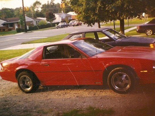It was a 1984 Z28 5 speed. After awhile, I found a stock 350 4 bolt and did pretty good tearing up the streets. I didn't have much money but they were good times. This pic has those hammer wheels with "those" tires. I was running the 305 here, but upgraded to the 91Z28 16" wheels when I got the 350.