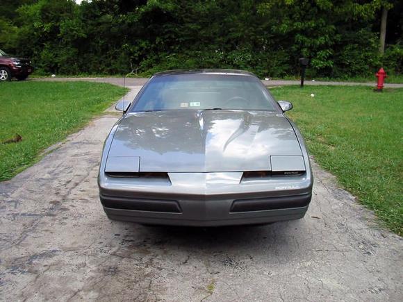 It's July 6, 2008 and I got the rest of the body on the car today. The air dam doesn't fit right, it's the one from the TA trim, the one from the 90 was broke in two. So since this one doesn't fit right I'll be getting a new one soon.