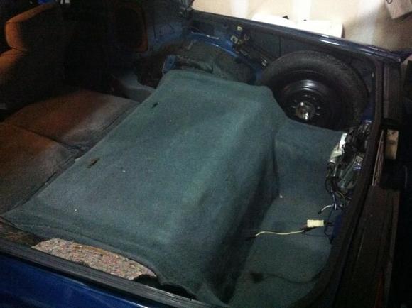 Removal of non carpeted rear plastics.