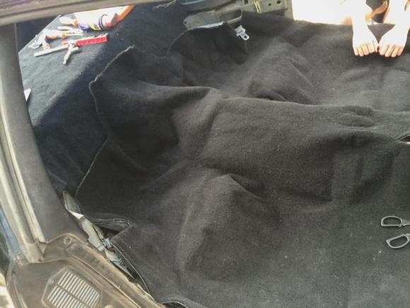 not taping down the back, need to get seats done and hoping spring/summer heat in south Texas relaxes it a bit to take form.